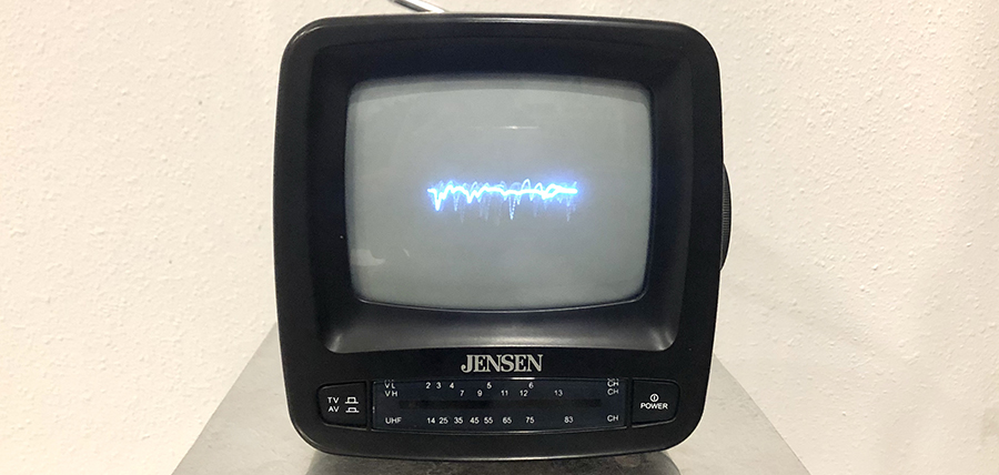 photo of small television with electronic signal line