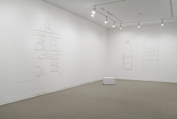 Brian Jungen, Wall Carvings, 2006, mixed media, dimensions variable. Installation view, Vancouver Art Gallery, Vancouver, 2006