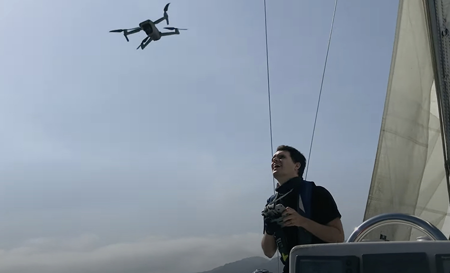 photo of Kyle McDonald flying a drone