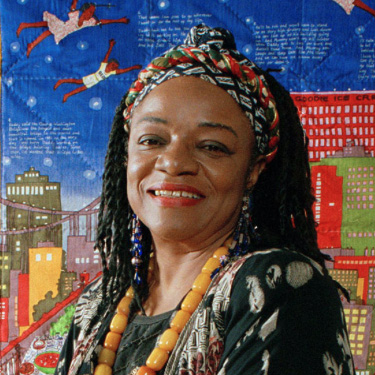 Faith Ringgold in front of Tar Beach 2. Photo by Kathy Willens Fair Use