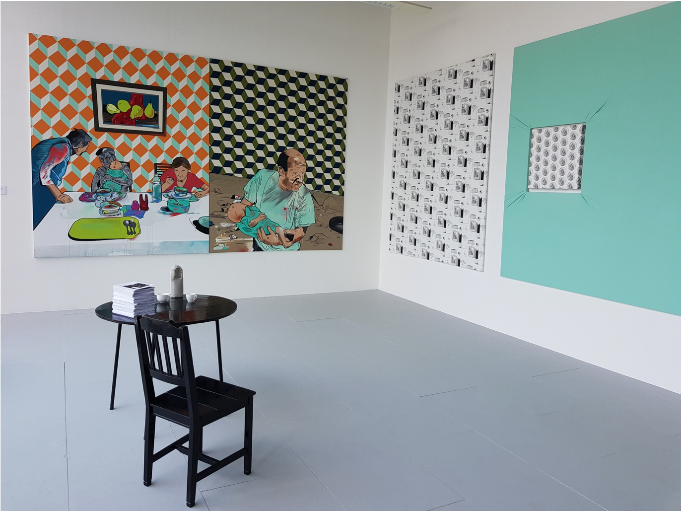 installation photo with multiple paintings on walls