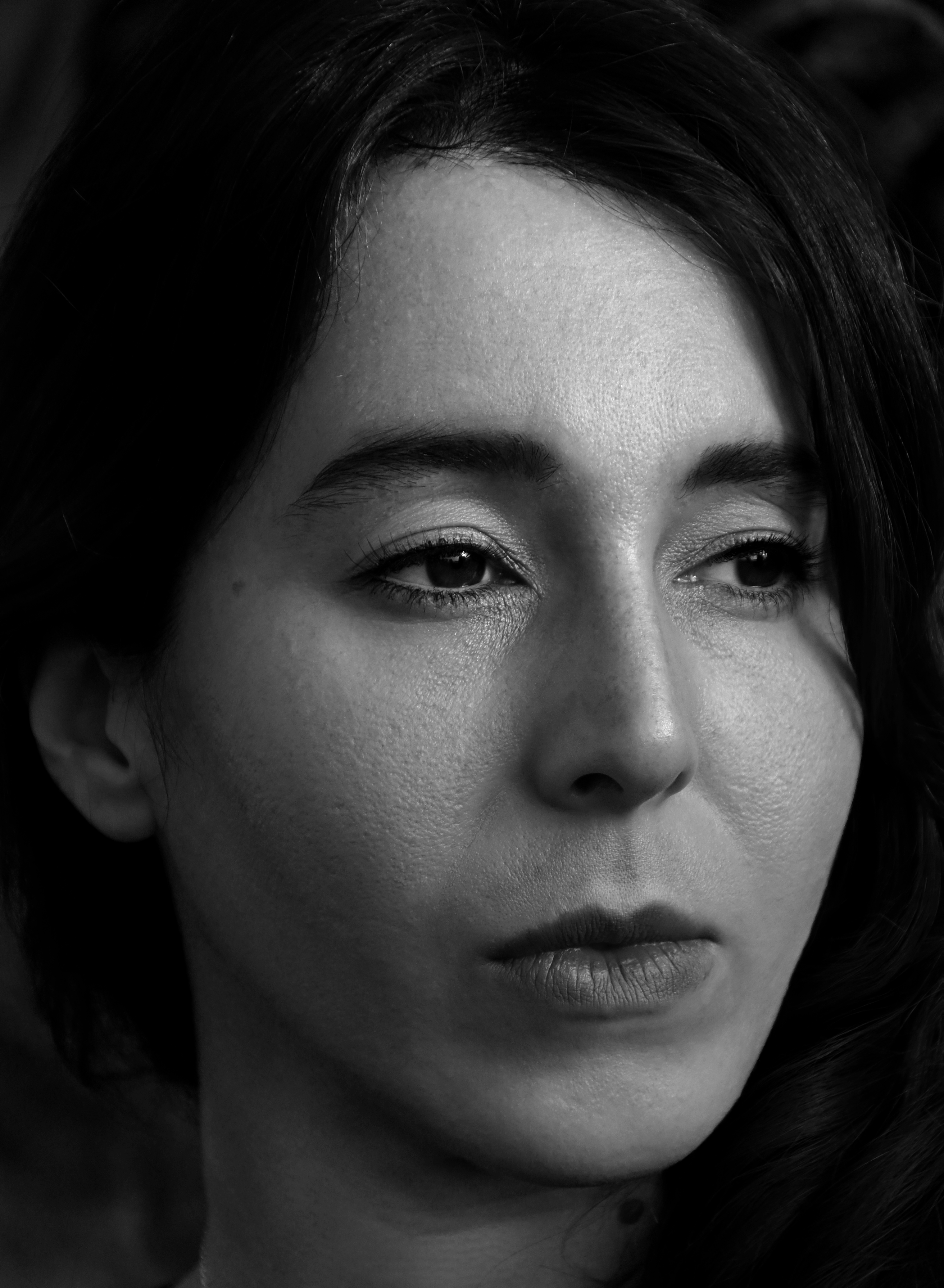 Close-up, black & white photo of Hande Sever